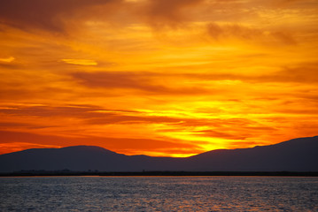 Red sunset over the aegean sea of Izmir, Turkey