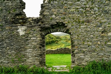 Pastoral Meadow as Seen Through a Stone Window of a Ruined Castle