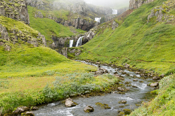Fototapeta na wymiar Klifbrekkufossar falls in summer season view, Iceland.