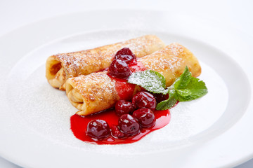 sweet pancakes with cherries