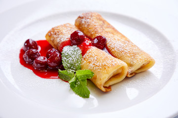 sweet pancakes with cherries