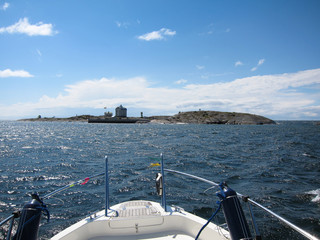 Motor boat at blue Baltic Sea on a beautiful sunny day, Aland, Finland. 