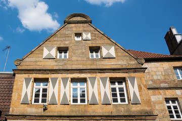 Brick house with shutters in Rheine, Germany