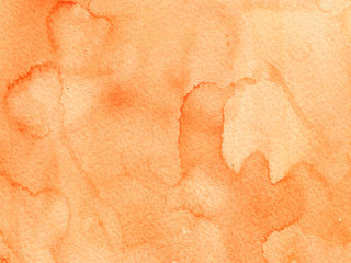 Hand painted abstract Watercolor Wet yellow and orange Background with stains.
