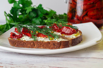 Sun dried tomatoes with olive oil in a jar