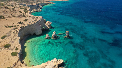 Aerial drone photo of tropical exotic white rock secluded rocky bay with turquoise sea