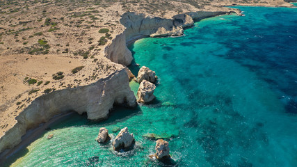 Aerial drone photo of tropical exotic white rock secluded rocky bay with turquoise sea