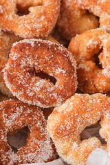 Traditional fried donuts with sugar