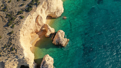 Aerial drone photo of tropical exotic white rock secluded rocky bay with turquoise sea