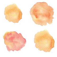 Hand painted abstract Watercolor Wet yellow and orange stains isolated on white background.