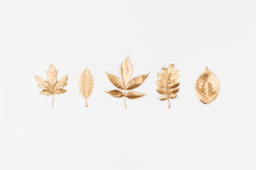 Autumn composition. Autumn golden leaves on white background. Flat lay, top view, copy space