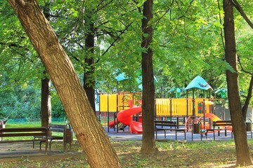A beautiful playground in the courtyard of a residential building.