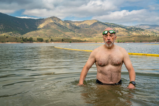 open water swimming in mountain lake