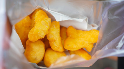 Deep-fried homemade dough-stick it call 