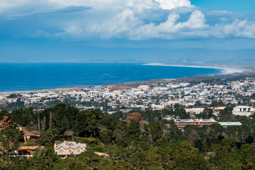 Fototapeta na wymiar View of Monterey Bay in California, from a nearby hilltop, including cities of Monterey and Seaside. 