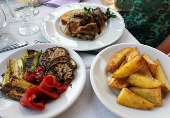 at the restaurant: meat and vegetables