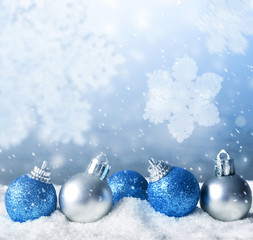 Christmas balls and snowflake on abstract background
