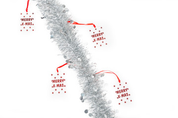 Christmas silver garland with Merry Christmas labels on white background.