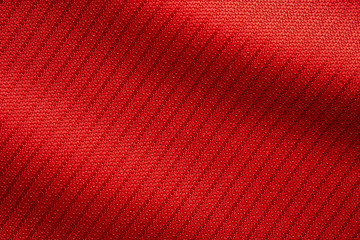 Red sports clothing fabric football jersey texture close up