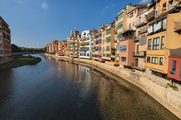 Fototapeta na wymiar River houses colourful facades on a urban cityscape in Girona, Catalonia