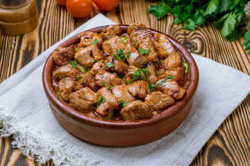 skewers of chop shish Turkish cuisine on wooden table
