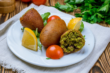 icli spice Turkish cuisine on wooden table