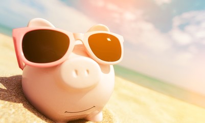 Piggy Bank Wearing Sunglasses Relaxing At The Beach