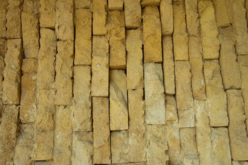 Yellow old grunge Brick Wall Vintage Stone Texture Background