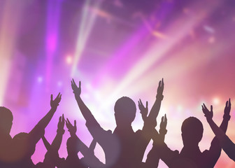 Plakat soft focus of christian people group raise hands up worship God Jesus Christ together in church revival meeting with blurred music concert light background can be used for Christian worship background