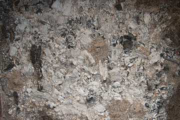 Ash in fireplace natural pattern, background, texture