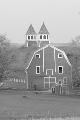 Black and white of a Massive historic wood barn in the midwest USA