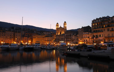 Obraz premium View of St Jean Baptiste cathedral and old port of Bastia ,second largest corsican city and main entry point to the island