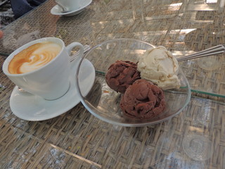 cup of tea and cookies on wooden table