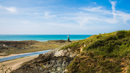Pléneuf-Val-André Lighthouse with Turquoise Blue Atlamtic Ocean on a Sunny Summer Day in Brittany France