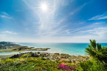 Pléneuf-Val-André Lighthouse with Turquoise Blue Atlamtic Ocean on a Sunny Summer Day in Brittany France