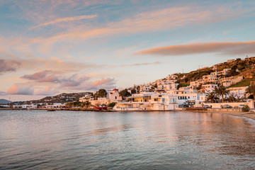 Fototapeta na wymiar Chora Mykonos, Mykonos/ Greece - 01 22 2019 - Sunset on the famous Cycladic island with romantic evening mood by the sea and view from little venice with fishing boats and white villas for holidays