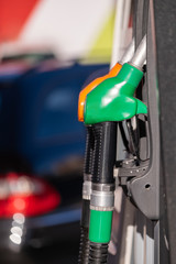 View of a Colorful Petrol pump filling nozzles, Gas station in a service