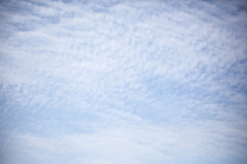 Blue sky and light clouds. Beautiful sky background.