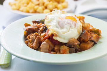 Spanish sarter pisto sauce with egg