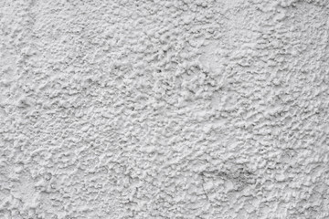 Gray stucco on wall of house. Construction industry.