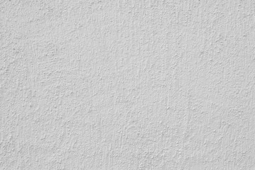 Gray stucco on wall of house. Construction industry.