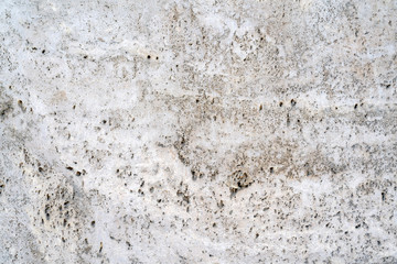 Gray stucco on wall of house. Construction industry.