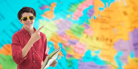 young man with map and luggage travel and adventure