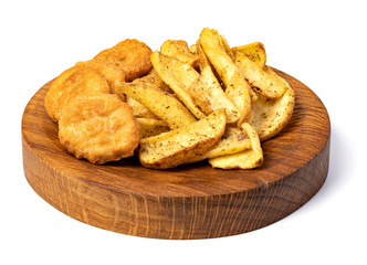 Tasty fried nuggets and potatoes