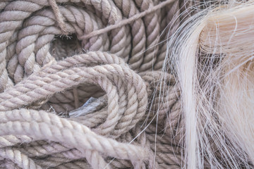  Background from jute products. Ropes from jute fiber.