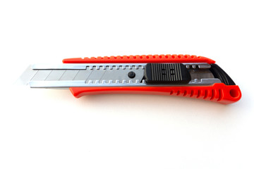 A red cutter isolated on white background.