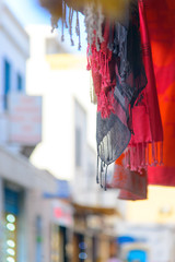 Hanging shawls on a street background, Mahdia, Tunisia