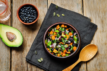 Black bean roasted sweet potato pepita avocado salad