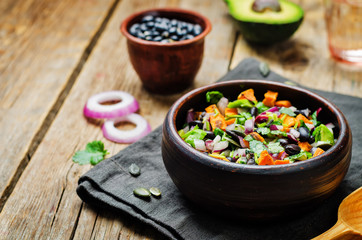 Black bean roasted sweet potato pepita avocado salad