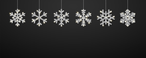 Shining silver snowflakes on black background. Christmas and New Year background. Vector illustration